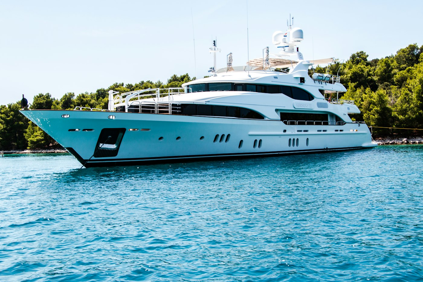 Luxury yachts docked at Precision Marina at sunset